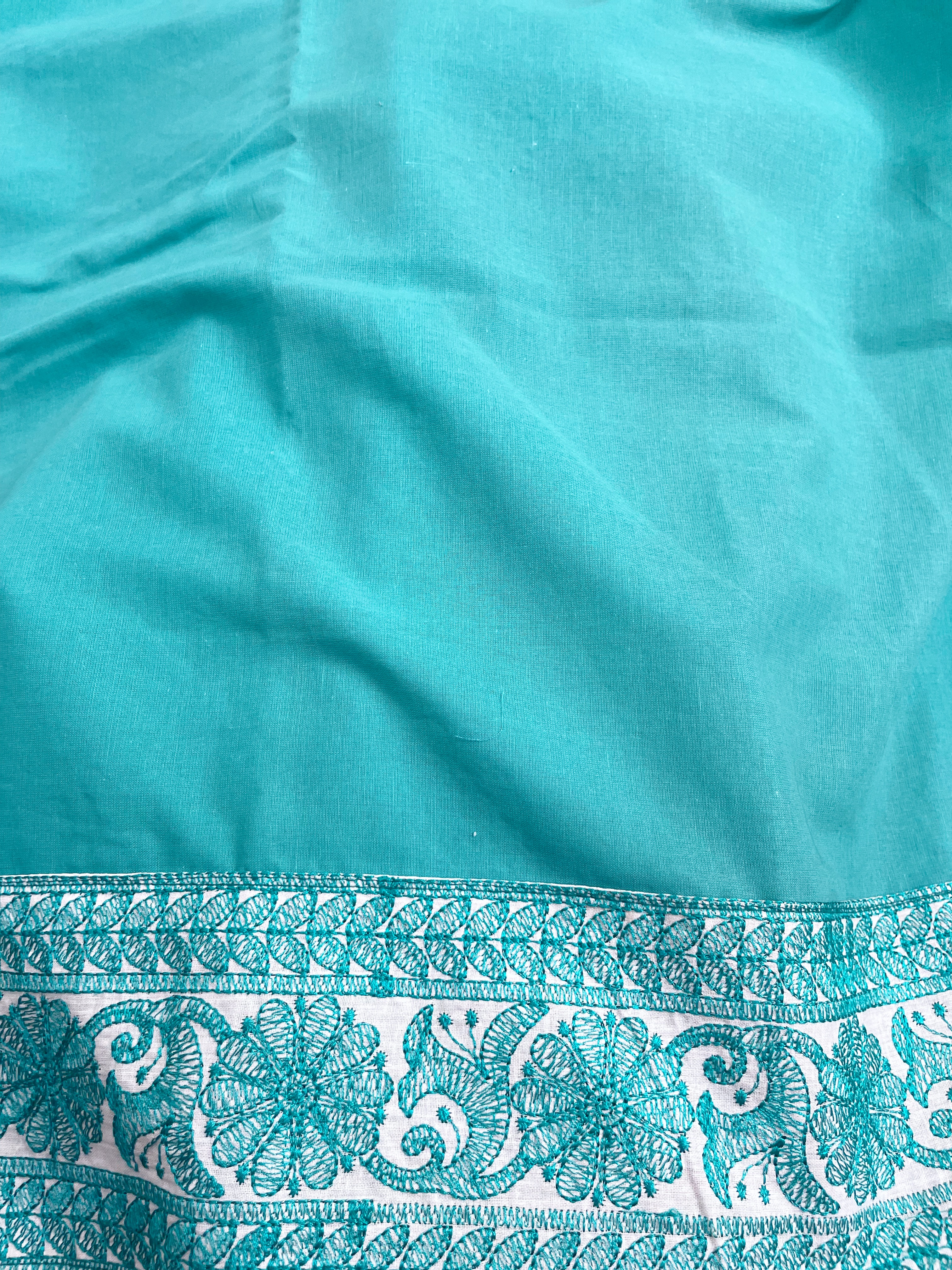 A green supernet saree with embroidery