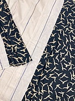 A Cream and Black Patli Pallu Khesh Saree