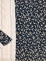 A Cream and Black Patli Pallu Khesh Saree