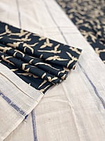A Cream and Black Patli Pallu Khesh Saree
