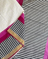 Kasavu with Handblock Prints Pink Border Kasavu with Handblock Prints Pink Border