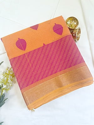 Apricot Shade Saree with Magenta Buttas